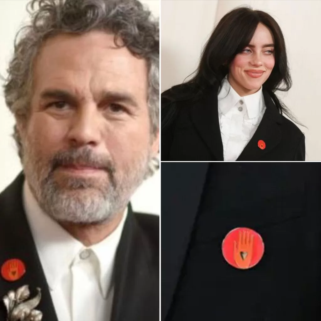 If you saw Hollywood celebrities wearing red pins at the Oscars – you need to know what it means