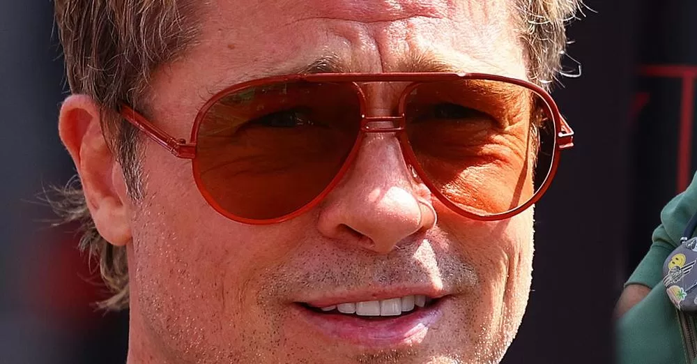 Brad Pitt looks in good spirits as he arrives at the Grand Prix in Hungary to continue filming scenes for F1 film